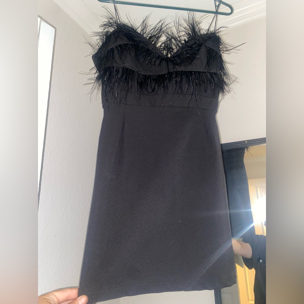 Black feather dress from Nasty Gal